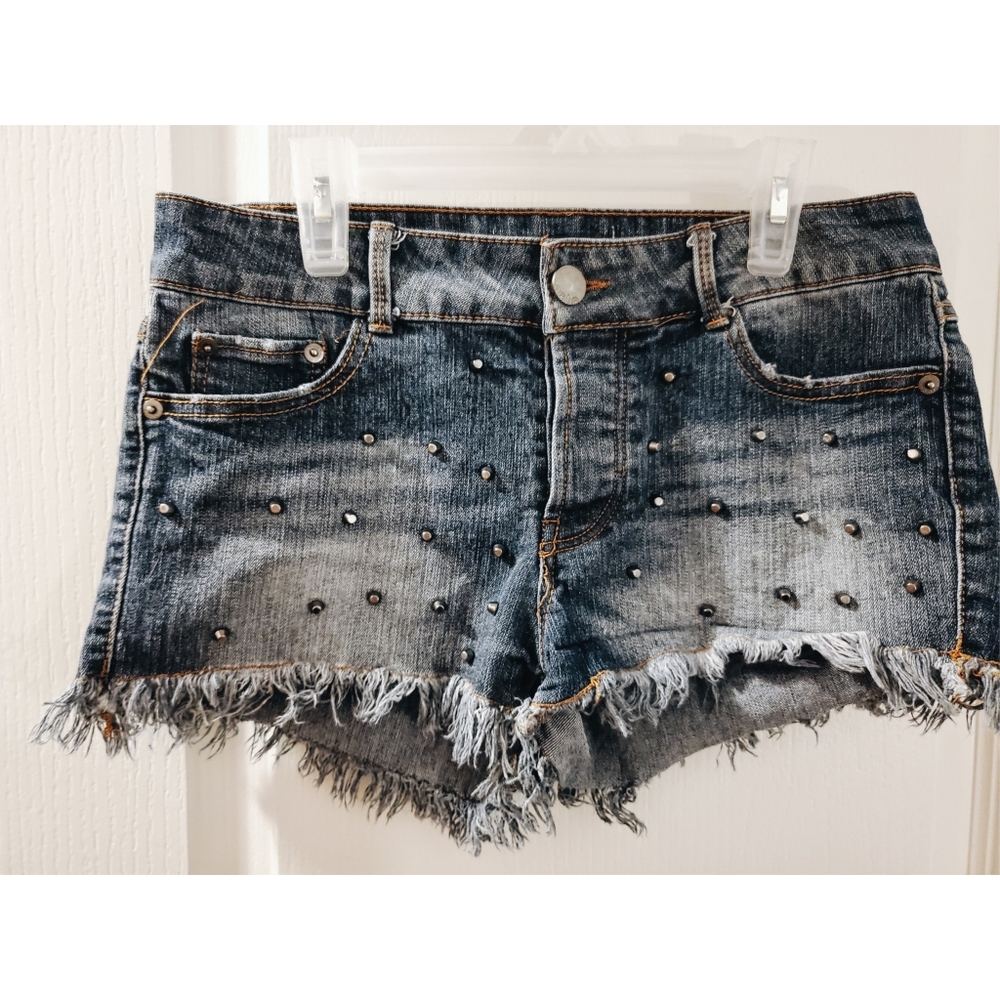 Frayed studded jean shorts